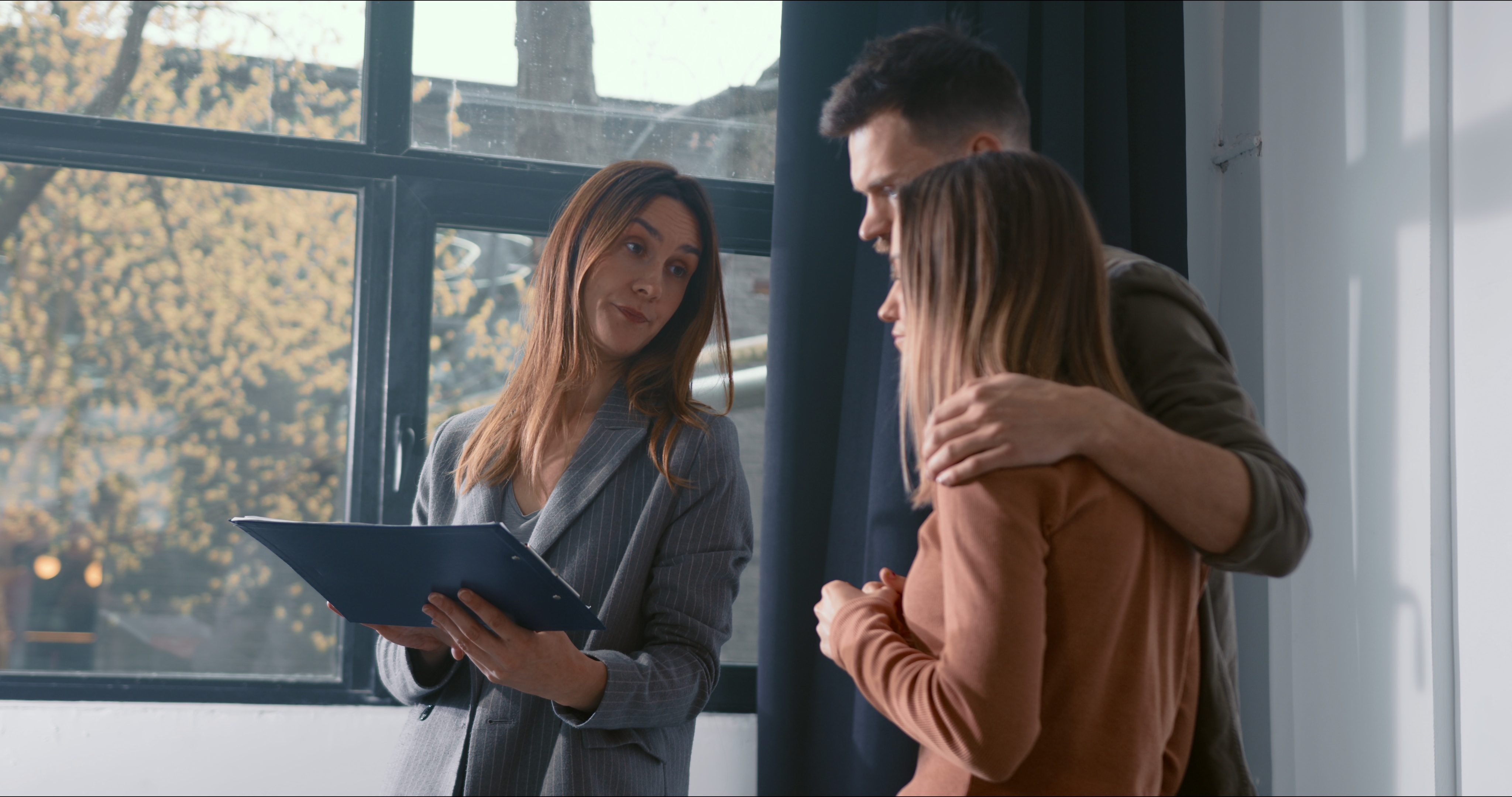 First-home buyers speaking with a property adviser