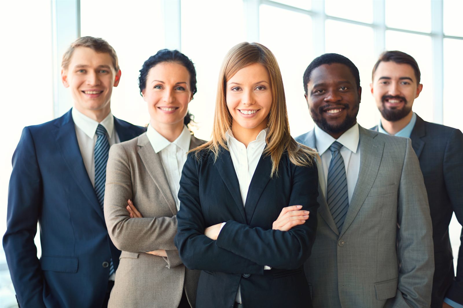 Professionals in business attire representing high paying careers in New Zealand