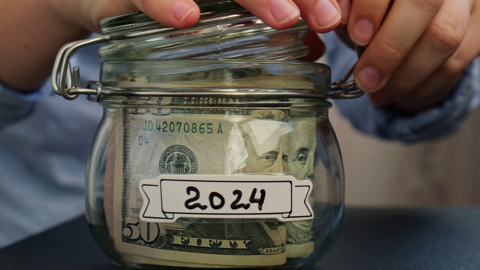 Money in a jar for the New Zealand financial year